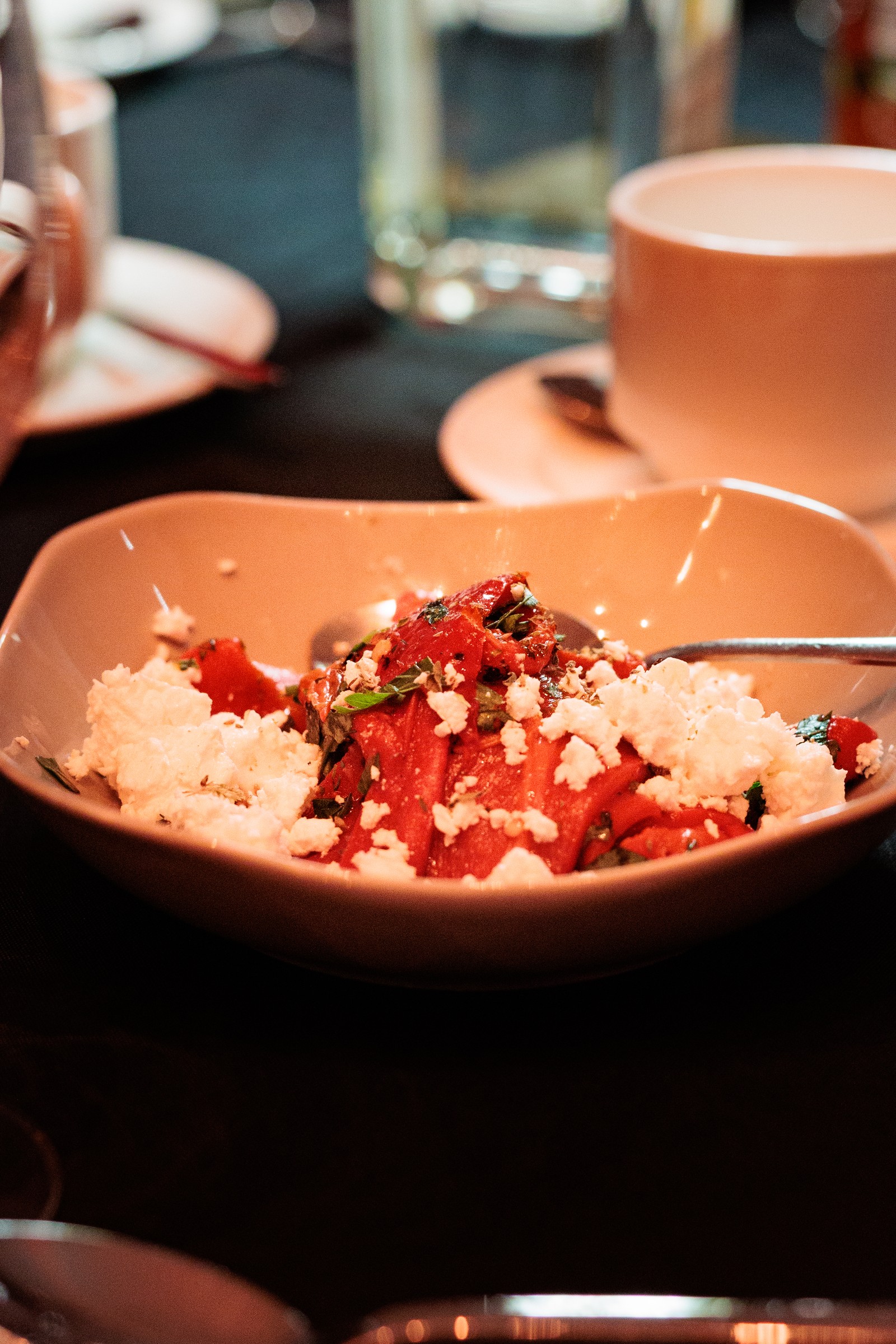 Watermelon and feta salad served in a ceramic bowl